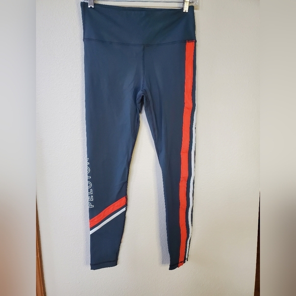 Peloton leggings, green with orange and white stripe. - Picture 1 of 4